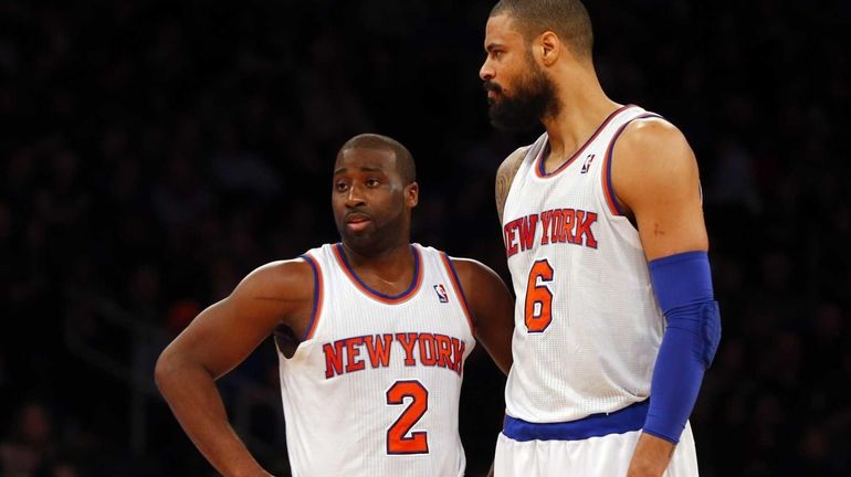 Raymond Felton and Tyson Chandler of the Knicks look on...