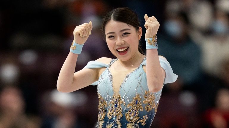 Rika Kihira of Japan reacts following her free skate program...