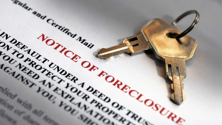 House keys and foreclosure notice.