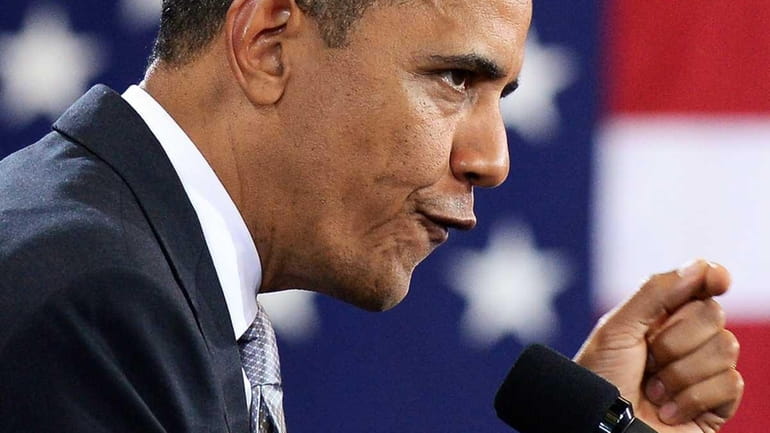 US President Barack Obama speaks during a campaign event at...