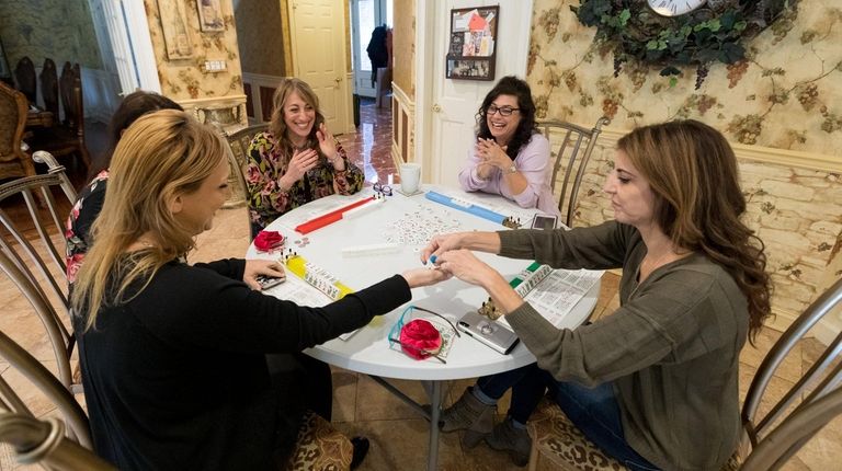 Clockwise from lower left, Roz Davidovich of Melville, Amy Kauffman...