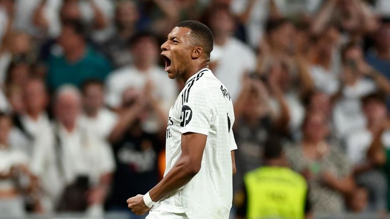 Real Madrid's Kylian Mbappe celebrates after scoring his sides second...