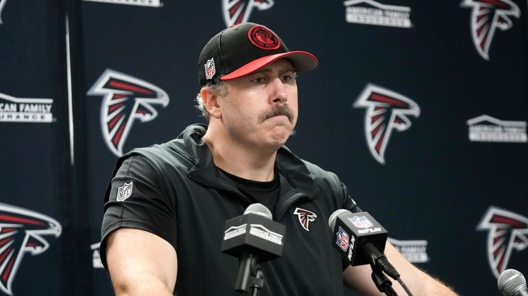 Atlanta Falcons head coach Arthur Smith talks after an NFL...