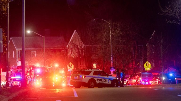 Arlington County Fire Department fire and police vehicles fill the...