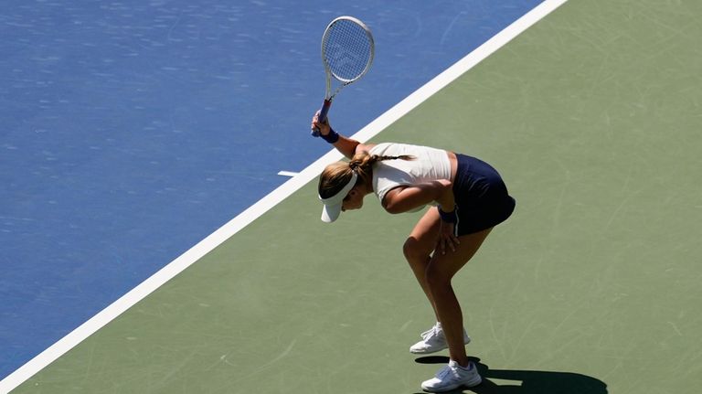 Danielle Collins, of the United States, reacts during a match...