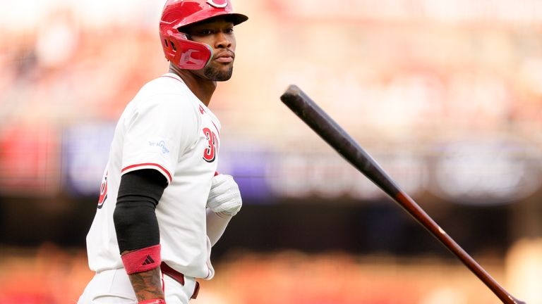 Cincinnati Reds' Will Benson reacts after hitting a two-run home...