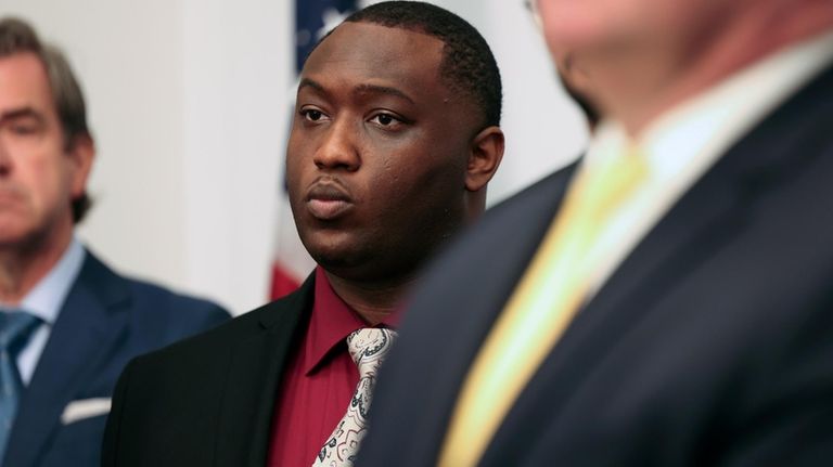 Phillip Goodwin, 24, appears at a news conference in Chicago...