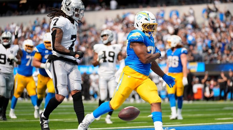 Los Angeles Chargers running back J.K. Dobbins (27) reacts after...