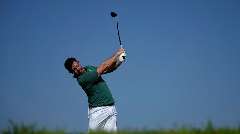 Rory McIlroy, of Ireland, hits from the seventh tee during...