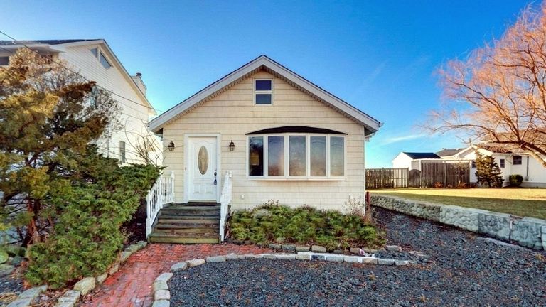 This $888,000 East Massapequa home was built in 1928.