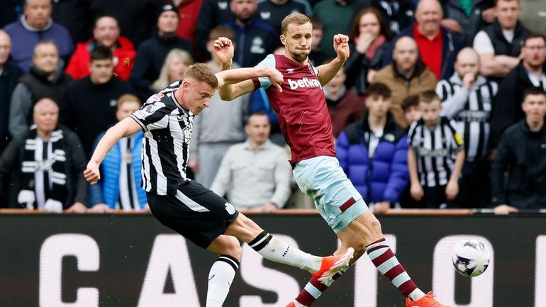 Newcastle United's Harvey Barnes scores during the English Premier League...