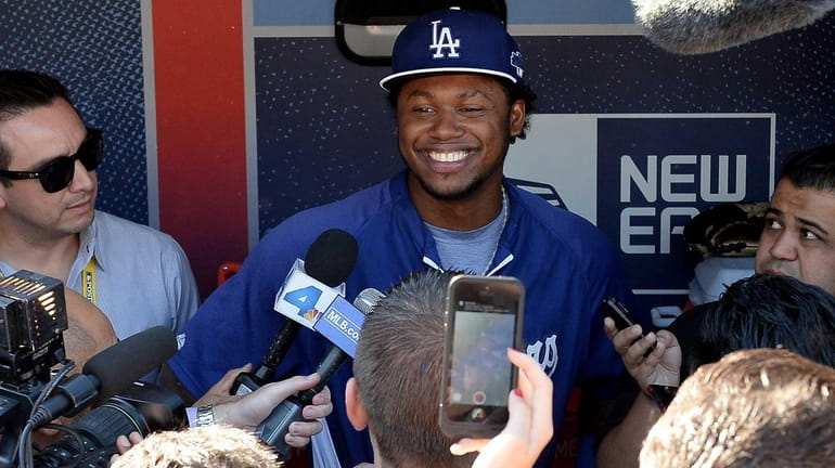 Los Angeles Dodgers shortstop Hanley Ramirez answers questions before Game...