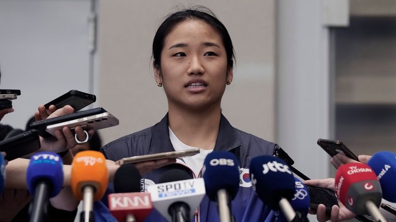 South Korean badminton star An Se-young, the women's singles winner...