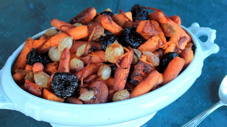 Baby-cut carrots, sweet potato, apricots, prunes and pear onions roast...