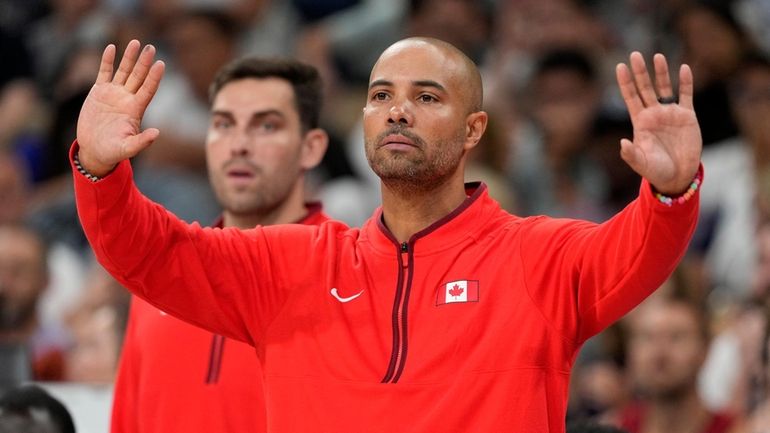 Canada head coach Jordi Fernandez gestures to his team in...