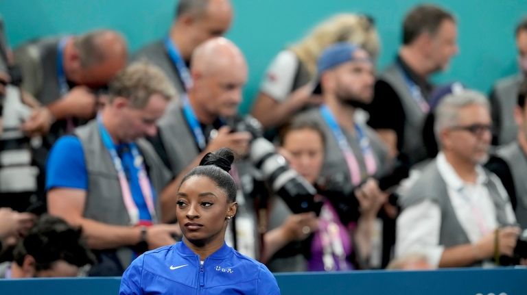 Simone Biles, of the United States, prepares to compete during...