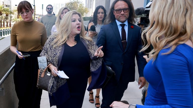 Former Las Vegas City Councilwoman Michele Fiore, center, refuses to...