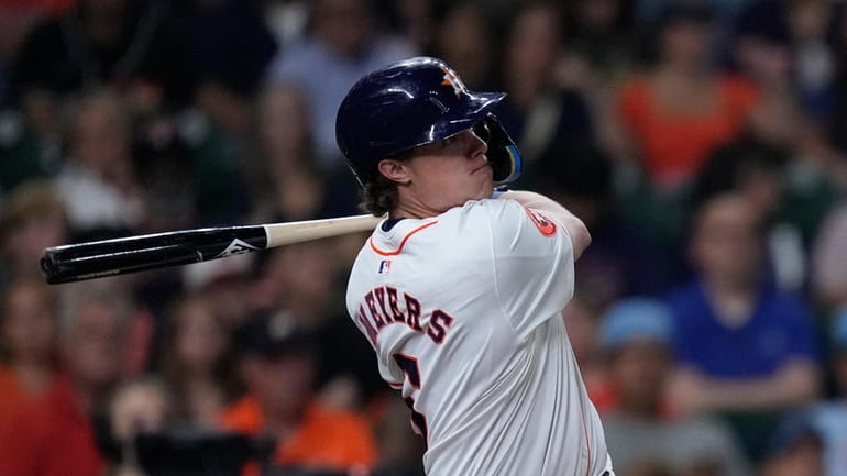 Houston Astros' Jake Meyers hits an RBI double during the...