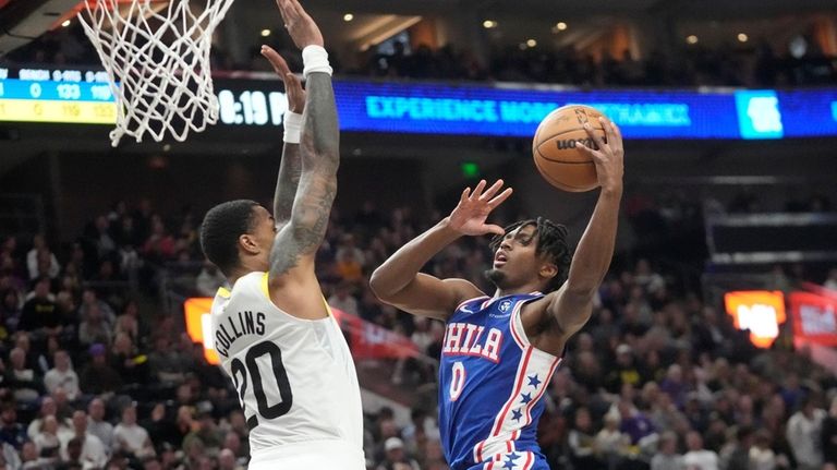 Philadelphia 76ers guard Tyrese Maxey (0) goes to the basket...