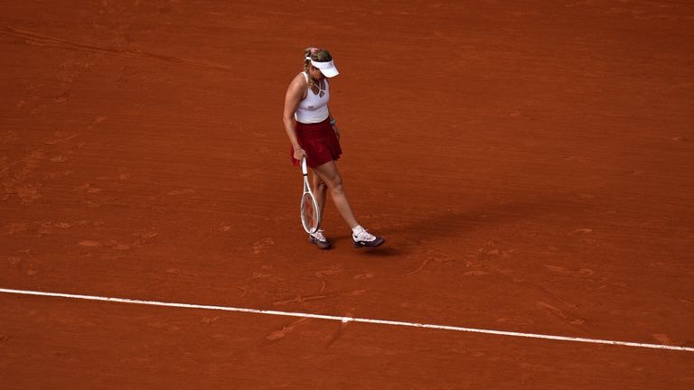 Croatia's Donna Vekic reacts as she plays China's Zheng Qinwen...