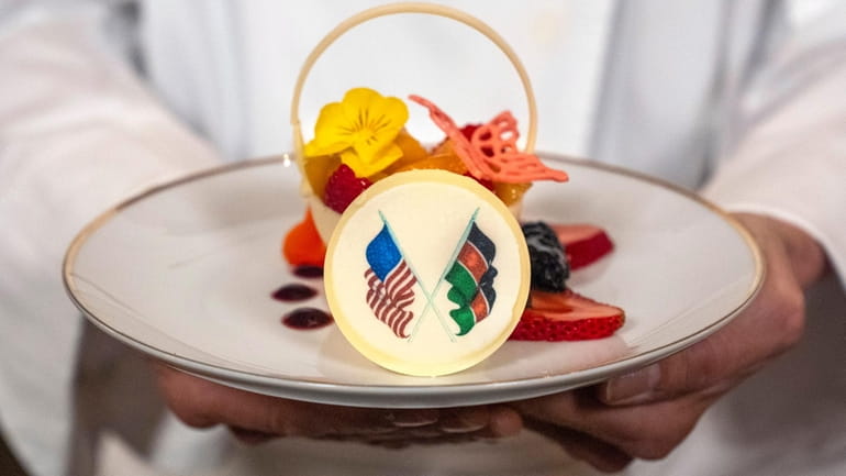 White House Executive Pastry Chef Susie Morrison holds a dessert...