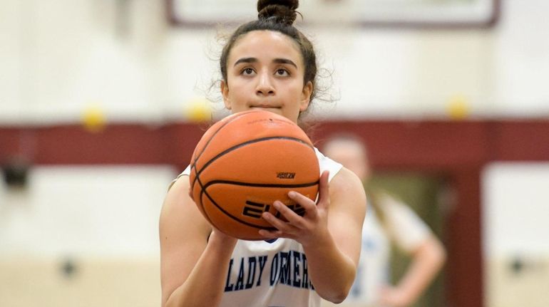 Samantha Shea of Our Lady of Mercy takes her foul...