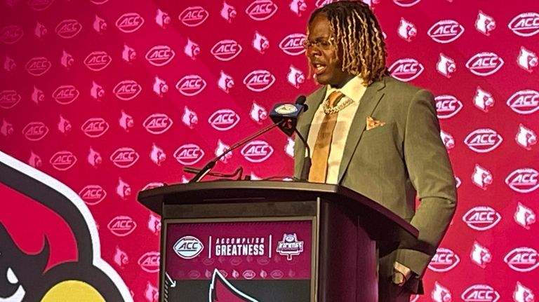 Louisville defensive back Quincey Riley speaks during the Atlantic Coast...