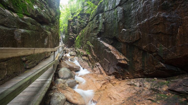 Narrow Flume Gorge and walkway at Franconia Notch in New...