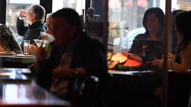 Diners eat lunch at Max's Oyster Bar in West Hartford,...