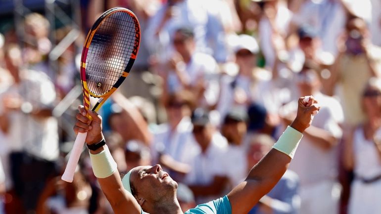 Spain's Rafael Nadal celebrates after winning his semifinal match against...