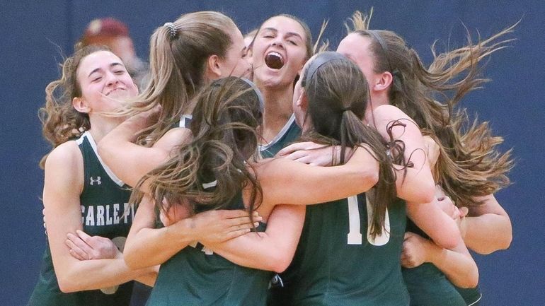 Carle Place celebrates their win during the Long Island Class C...