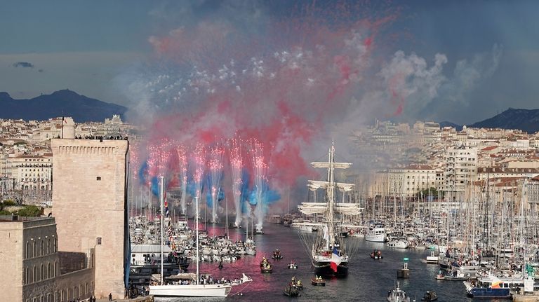 Fireworks go off as the Belem, the three-masted sailing ship...