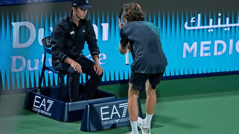 Andrey Rublev reacts in front a linesman during his semi...