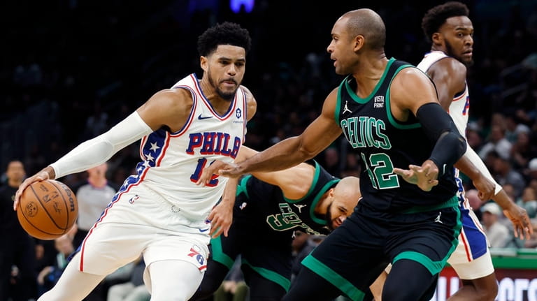 Boston Celtics' Al Horford (42) defends against Philadelphia 76ers' Tobias...