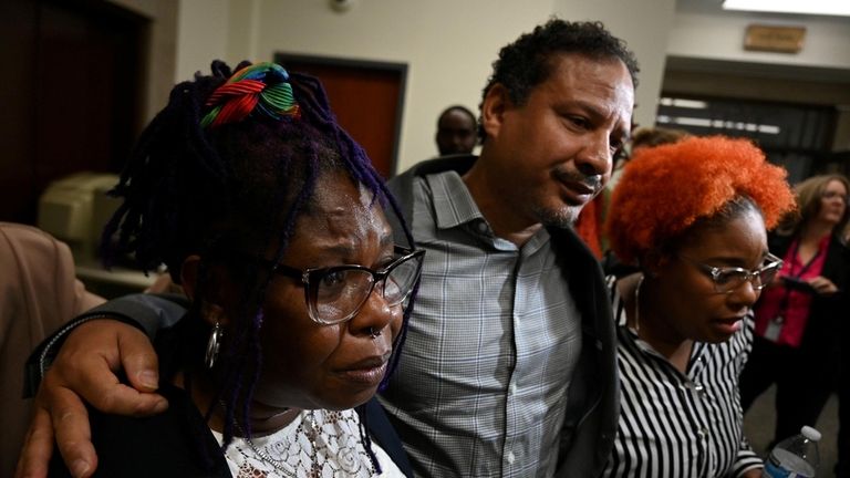 Khaseen Morris' family, from left, mother AnnMarie Morris, father Bryan Morris and...