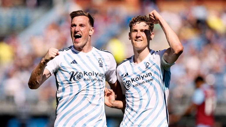 Nottingham Forest's Chris Wood, left, celebrates scoring his side's second...