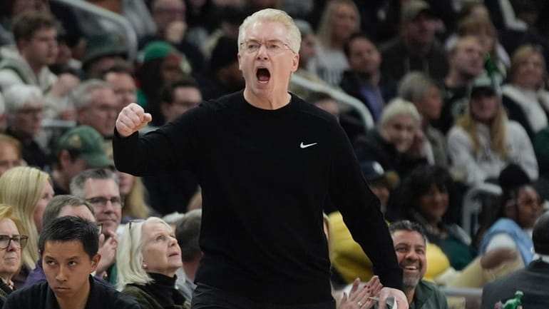 Milwaukee Bucks interim head coach Joe Prunty reacts during the...