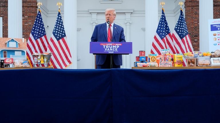 Republican presidential nominee former President Donald Trump speaks at a...