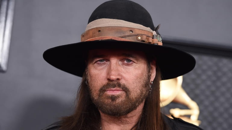 Billy Ray Cyrus arrives at the 62nd annual Grammy Awards...