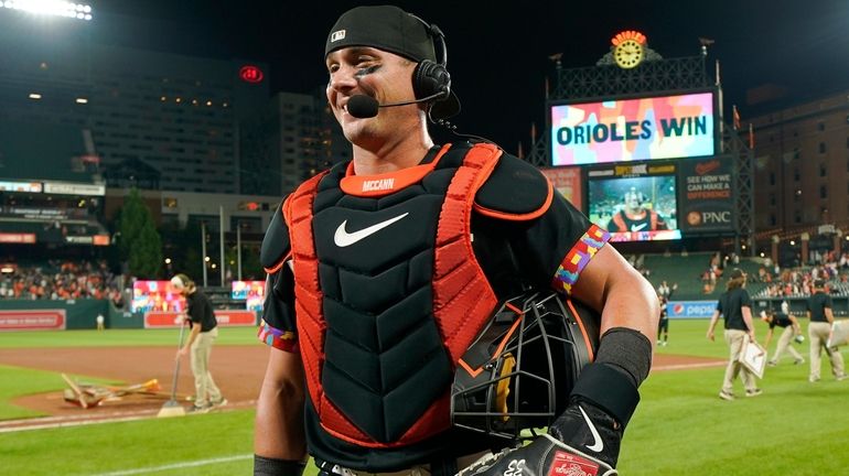 Orioles catcher James McCann is interviewed after a game against...