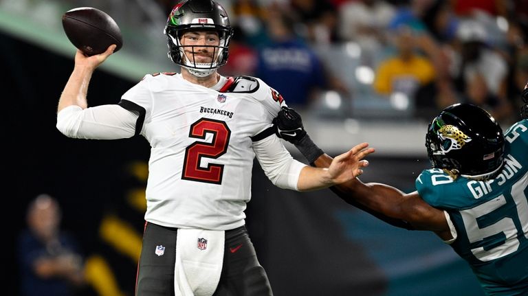 Tampa Bay Buccaneers quarterback Kyle Trask (2) throws a pass...