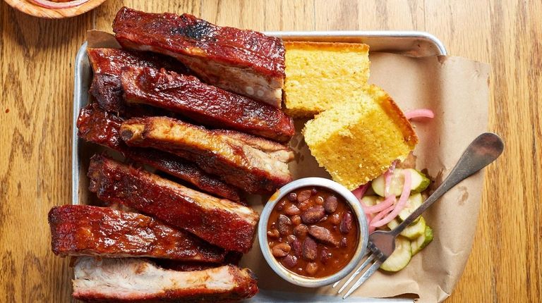 St. Louis style ribs, cornbread, and baked beans at Swingbellys in...