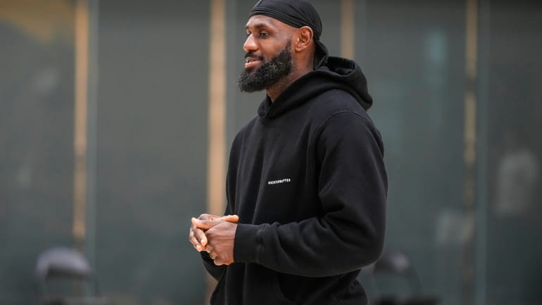 Los Angeles Lakers' LeBron James attends a news conference held...