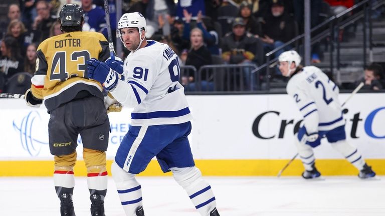 Toronto Maple Leafs center John Tavares (91) reacts after scoring...