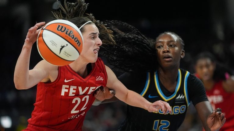 Chicago Sky forward Michaela Onyenwere, right, guards Indiana Fever guard...