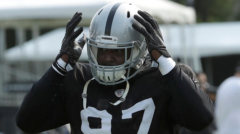 Then-Raiders defensive end Mario Edwards Jr. during practice in Napa,...