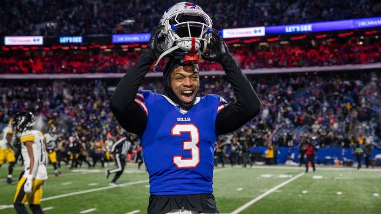 Buffalo Bills safety Damar Hamlin (3) reacts after an NFL...