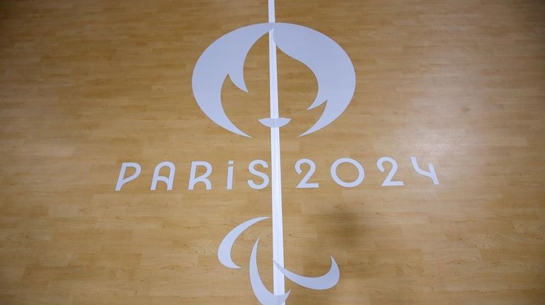 The logo of the Paralympic Games is seen on the...