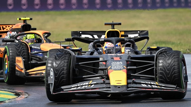 Red Bull Racing driver Max Verstappen of the Netherlands, front,...