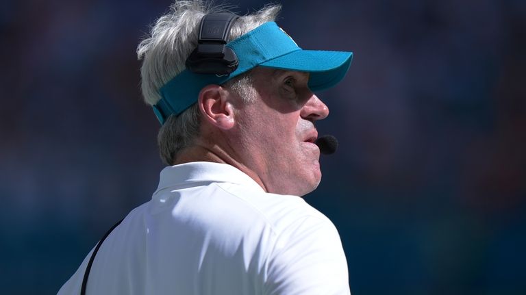 Jacksonville Jaguars head coach Doug Pederson looks up a the...